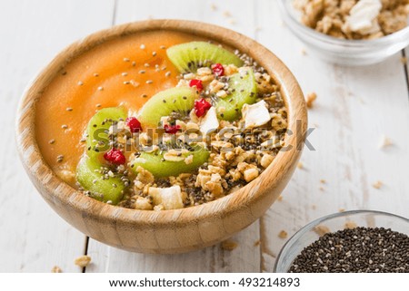 Similar – Smoothie with fruit,cereals and chia on white wooden table