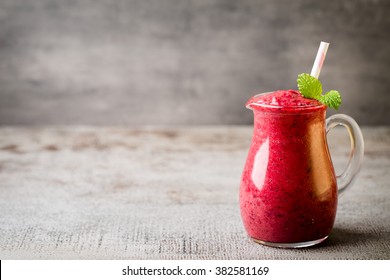 Smoothie, Pink Juice On The Grey  Background.