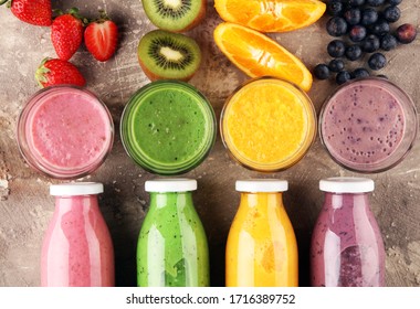 Smoothie variation. Healthy lifestyle concept. several bottles with fruit and berry juices smoothies and milkshakes
