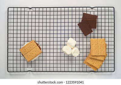 Smores Ingredients On A Cooling Rack Flat Lay Isolated On White