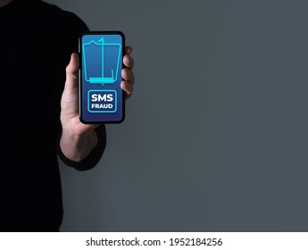 SMS Fraud Phone Concept, Man Holding Phone With Text Message Alert On Screen