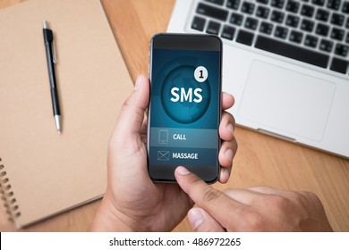 SMS Messaging Communication Notification Alert Reminder  Sms Thoughtful Male Person Looking To The Digital Phone Screen,Silhouette Top Computer And Hand