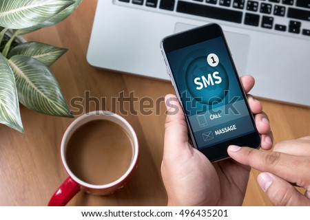 SMS Messaging Communication Notification Alert Reminder  sms Thoughtful male person looking to the digital phone screen,Silhouette top computer and hand