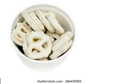 A Snack Bowl Of White Chocolate Covered Pretzels. 