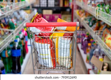 Snack Packs In Shopping Cart At Supermarket