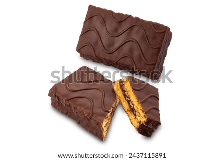 Snack si sponge cake filled and covered with chocolate, Whole chocolate snack and one cut isolated on white with clipping path included