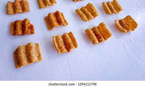 Snack Wavy Quinoa Chips On A White Backgrund