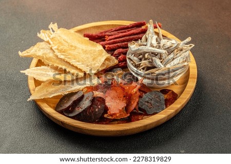 Similar – Image, Stock Photo Dried fish dried fish on bamboo grid