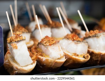 Snacks with cod fish in tapas bar in Spain, traditional Spanish food