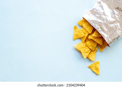 Snacks for party - bag of nachos chips. Top view - Powered by Shutterstock