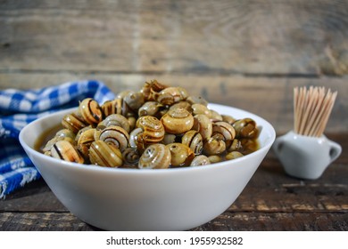 Snails tapa - Andalusia Traditional food on Wooden