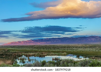 Snake Mountains Reflection Into Wetlands Of Great Basin National Park, Nevada, USA