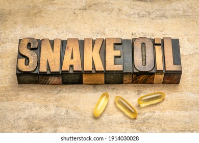 Snake Oil Word Abstract In Vintage Letterpress Wood Type, Chinese Medicine Or Any Cryptographic Method Or Product Considered To Be Bogus Or Fraudulent