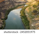 Snake River and bank facing east of the Perrine Bridge, Twin Falls, Idaho