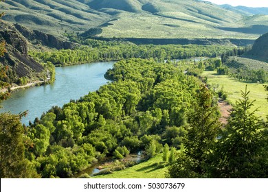 The Snake River Meandering Through The Desert Of Idaho.  The Snake River Provides World Class Fishing, Hunting, And Recreation.