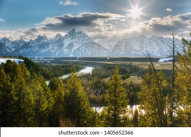 The Snake River Overlook Looks Over Schwabacher's Landing And Snake River, The Grand Teton Moutain Range In The Distance. Taken Sunset In Mid-May In Grand Teton National Park.