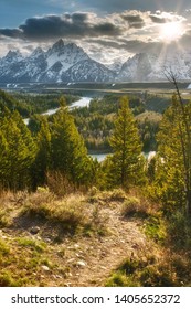 The Snake River Overlook Looks Over Schwabacher's Landing And Snake River, The Grand Teton Moutain Range In The Distance. Taken Sunset In Mid-May In Grand Teton National Park.