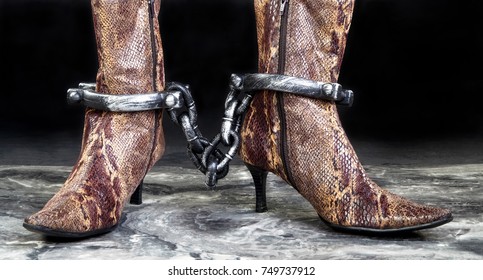 Snake Skin Boots In Leg Irons.