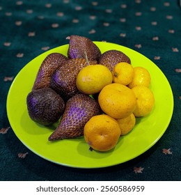 snakefruits and orange fruit dishes