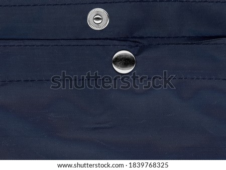 snap fastener on blue bag fabric texture ストックフォト © 