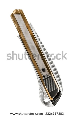 Snap off blade box cutter isolated on white background