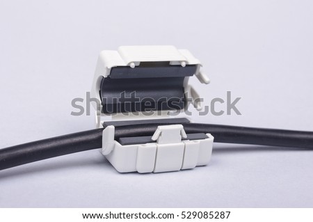 Snap on ferrite for EMC suppression