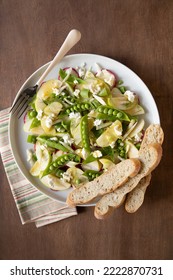 Snap Pea And Sliced Apple Salad With Radishes, Fennel, Goat Cheese And Honey Dressing