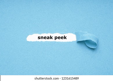 Sneak Peek Text Revealed By Peeling Off Torn Blue Paper Background - Abstract Preview Concept