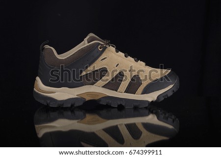 Sneaker on Black background, Isolated Product, Top View, Studio.