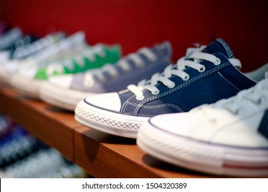 Sneaker Shoes On Shelf Wearing Street Fashion For Display To Sell On Shoes Store