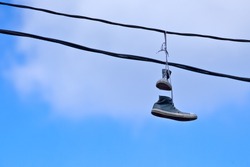 Sneakers Caught On A Telephone Wire