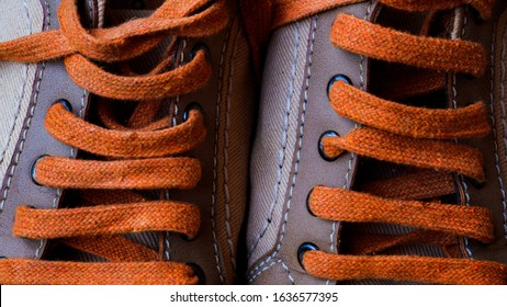 Sneakers Close Up. Shoelace Of Sport Shoes Macro Texture. Shoes On Wood Board.