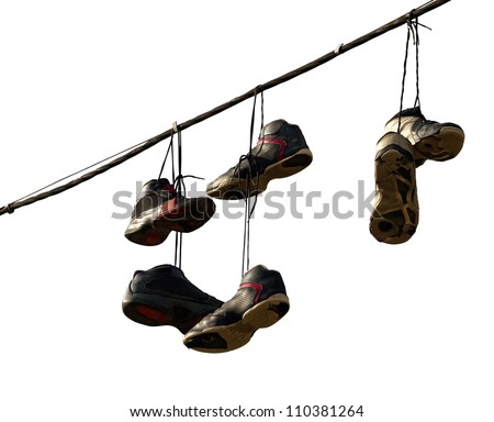 Sneakers hanging on a telephone line, urban youth joke