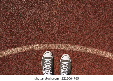 Sneakers On Outdoor Basketball Court, Top View, Copy Space Included