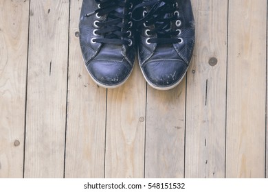 Old Sneakers On Wooden Planks Texture Stock Photo (Edit Now) 747473002