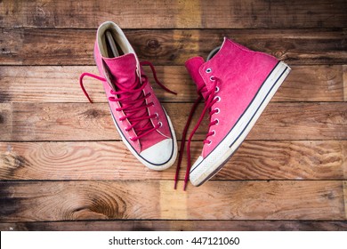 Sneakers on wooden floor - Powered by Shutterstock