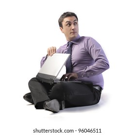 Sneaky Businessman Closing His Laptop