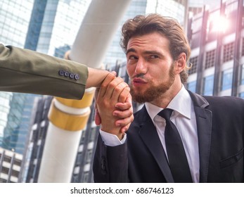 Sneaky Sly Tricky Bad Businessman In Suit Kissing His Enemies Hand