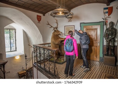 SNEZNIK, SLOVENIA - Sep 30, 2018: Couple Sightsee Unique Slovenian Interior Of Heritage National Museum Of Slovenia, Sneznik Castle