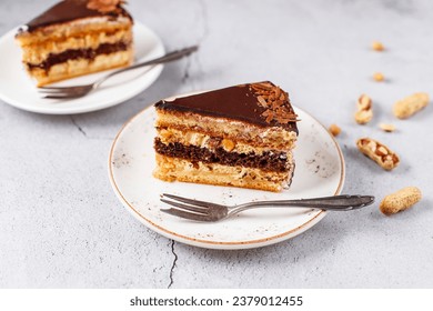 Snickers cake with caramel, peanuts and buttercream.