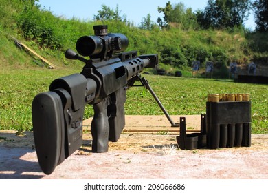 Sniper rifle .50 BMG caliber on shooting range.