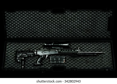 Sniper Rifle In A Case On The Dark Background