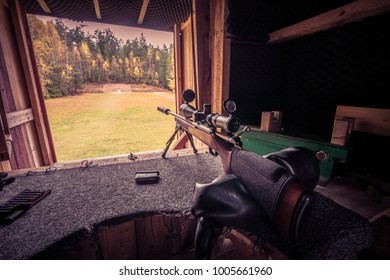 Sniper Rifle With Silencer And Scope At Shooting Range 
