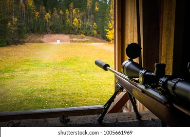 Sniper Rifle With Silencer And Scope At Shooting Range 
