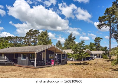 Snogebaek, Bornholm Island, Denmark - July 03, 2019. Traditional Wooden Summer Houses For Tourists By The Baltic Sea Beach In Snogebaek.