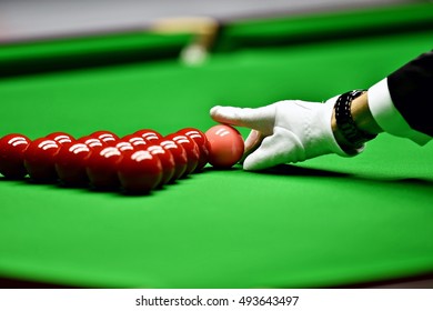 Snooker Referee Arranging Pink Ball At The Beginning Of A Game