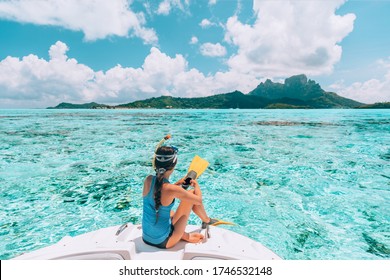 Snorkel Diving Excursion Boat Tour From Yacht Luxury Travel Influencer Going Swimming In Coral Reefs Of Tahiti, French Polynesia Bora Bora Island.