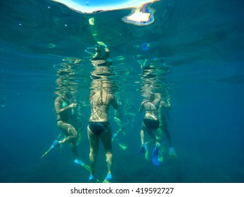 Snorkelers In The Water In Fiji