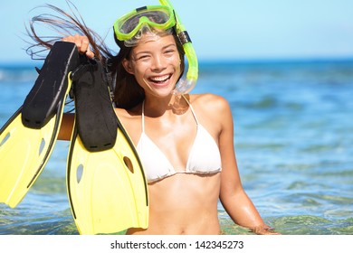 Snorkeling Fun On Beach - Woman Showing Fins, Snorkel And Mask While Doing Watersport On Summer Holidays Travel Vacation On Maui, Hawaii, USA. Beautiful Young Mixed Race Asian Caucasian Bikini Model.