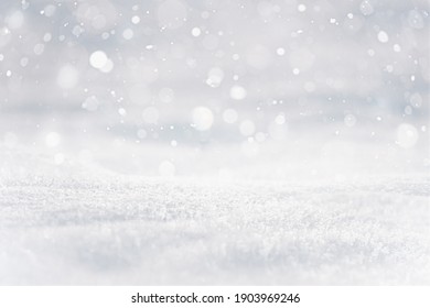 SNOW BACKGROUND AND SNOW FLAKES FALLING DOWN ON THE FROZEN SNOW COVER, BACKDROP FOR CHRISTMAS OR WINTER
